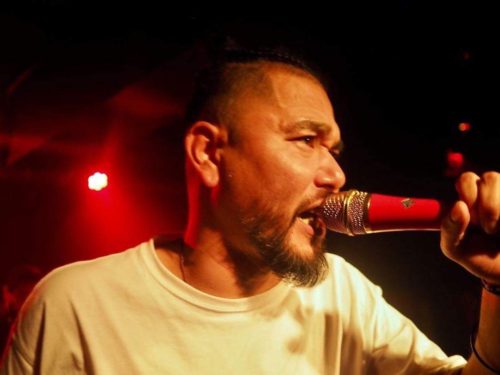 RITTO 人間、59式、沖縄県石垣島生まれ、那覇は曙ゲトー育ち。幼い頃からギタリストである父親の影響で音楽と隣り合わせの生活を送り、17歳の頃にラップをスタート。 2006年Libra Records主催による"ULTIMATE MC BATTLE"に沖縄から初出場を果たす その後、自主制作音源『STARTING POINT』『生きてる力』を発表。 2009年仲間と共に「赤土」を結成し、2013年自身初のフルアルバム「AKEBONO」を解放！ 2014年EP『Mi far Yu』発売。 2015年7インチでOLIVEOILとの「Ningen State Of Mind Pt.2」FReECOolとの「umui」J.A.K.A.M. a.k.a.MOOCHYとの「NEW DAY」をリリース。 2017年OLIVEOILとのアルバム『アブサン 2014~2017』をリリース、また加山雄三生誕80周年記念REMIXアルバムではRITTO×ALTZ名義で『夕陽は赤く』をREMIX。 2018年BEGINが制作したオリオンビール創立60周年記念シングル『ソウセイ』ではラップを担当した。 2019年同じ石垣島出身のCHOUJIとスペシャルユニットRICCHOを結成、アルバム『RICCHO』をリリース。その後韻シスト、SAIRU、WONK等バンドとのセッションや作品のリリース、KOJOE、GRIGRI、仲宗根創、DDS、Awich、CHICO CARLITO等様々な客演をこなし、 2022年客演にCHOZEN LEE、プロデュースにCROWDを迎えた『KUMONOUE』、 鹿児島出身のビートメーカーのYasu-Pacinoとのアルバム『Soul Searchin’』をリリース 2023年3月には、DMC Team Championsで世界5連覇を成し遂げた京都出身のターンテーブリストHi-Cとのアルバム『OPEN』をリリース 2024年12月、ビートメーカー&プロデューサーとして活躍するFReECOolが全曲を担当し、アートワークをLANP(from WARAJI)が担当した最新アルバム、ソロ名義としては実に10年ぶりとなるアルバム『久方ぶり』をリリース！ 益々目が離せない動きとなり現場を熱く湧かせ続けている！