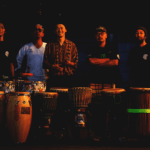 東京・吉祥寺を拠点に既成の概念をぶち破り続けるMC、RHYDA。足立区から魂を揺さぶる独自のリズムを紡ぐ打楽器集団、勝氣煙。東京の西と東の異端者たちがキャンプインパーティ「ゆめむら」でお互いのなにかがピキン！と共鳴したあの日。RHYDA唯一無二のラップと、勝氣の力強いリズム。二組の咆哮が夜空に響き渡った時、心の武者震いがドドドドドドドドこみ上がる。